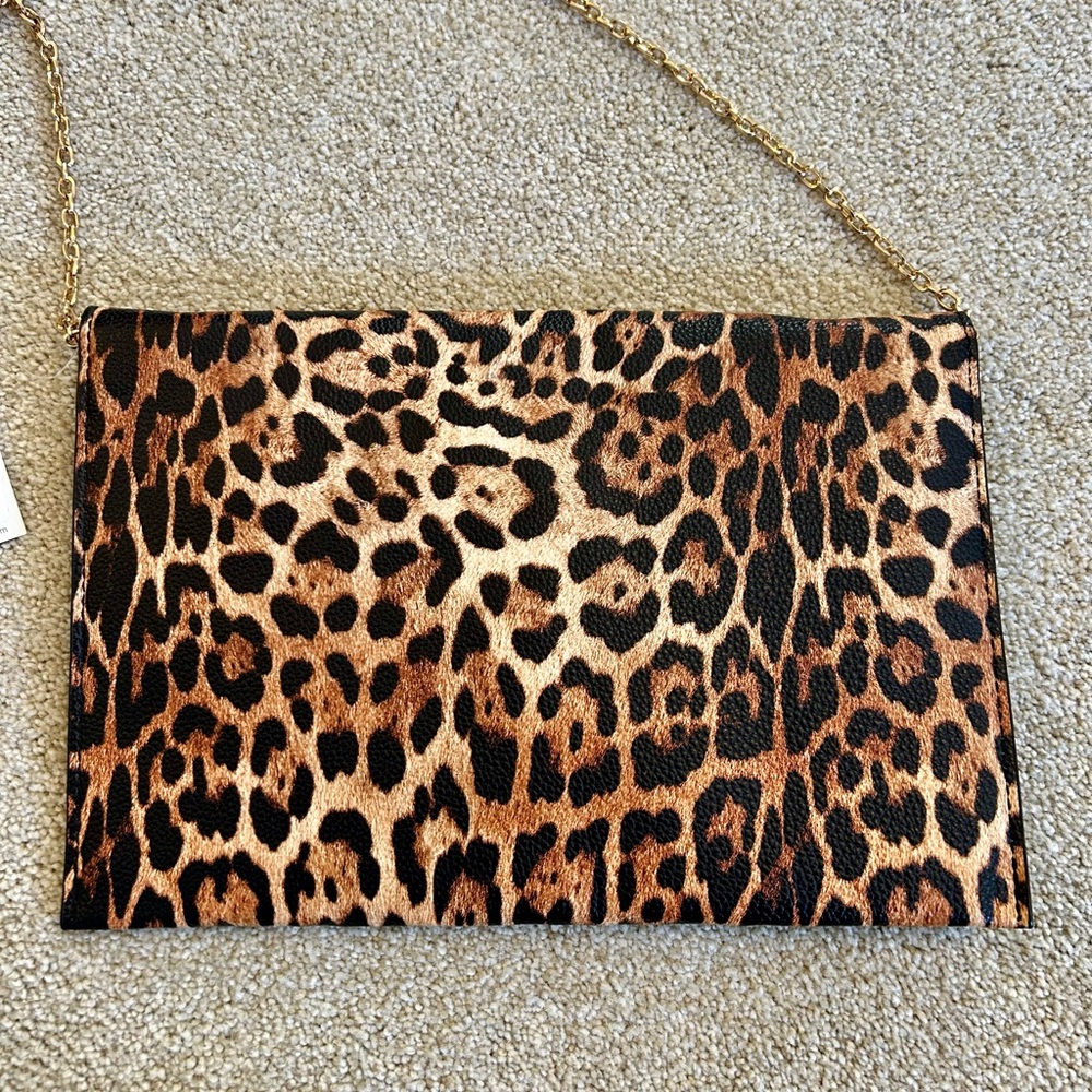 Francesca's Collections NWT  Brown and Gold Clutch leopard print.